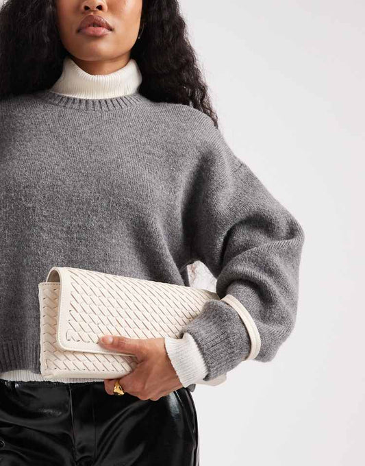 Glamorous woven clutch bag in cream