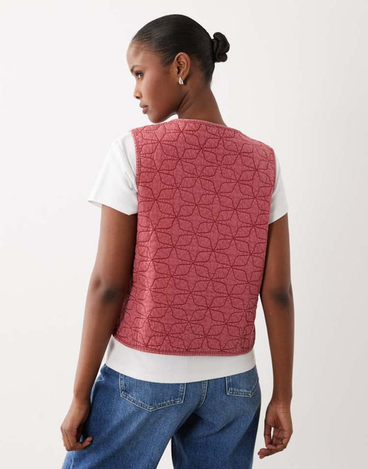 ASOS DESIGN quilted padded waistcoat with floral design in acid wash burgundy