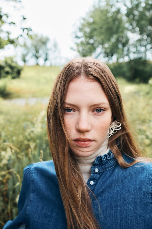 Frill-trimmed denim blouse
