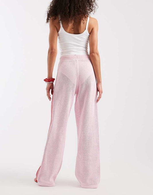 adidas Originals crochet track pants in pink and red