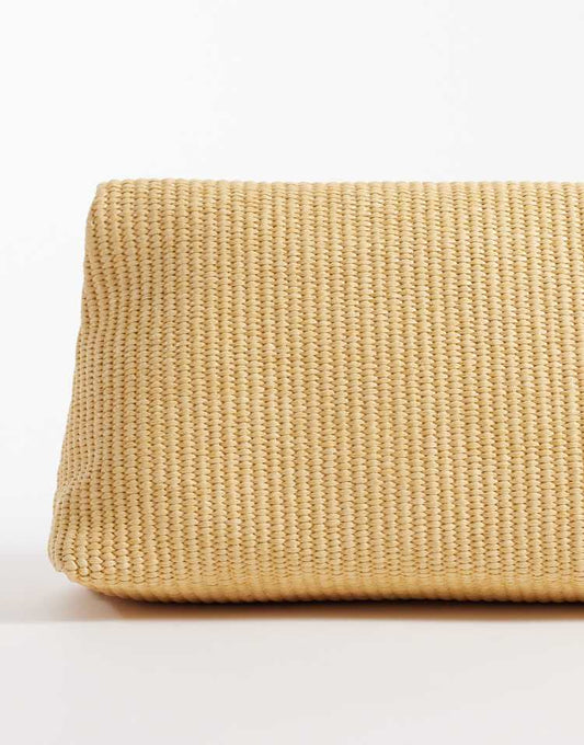 Elongated straw clutch bag with ball hardware in natural