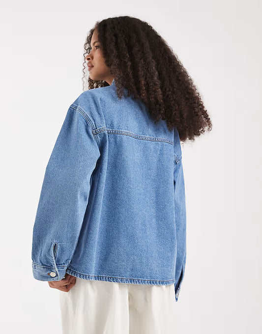 wrap front denim jacket in mid blue