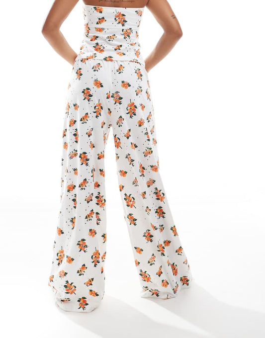 ASOS DESIGN broderie trouser with tie waist in white orange print