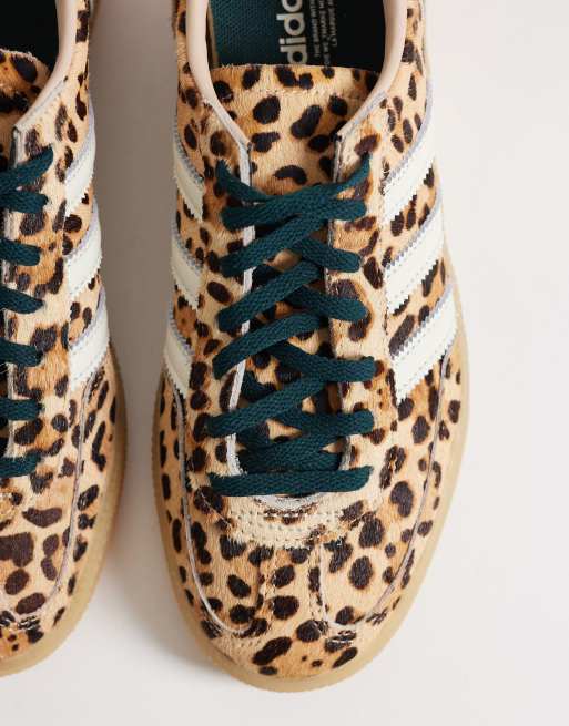 adidas Originals Handball Spezial trainers in leopard print with gum sole