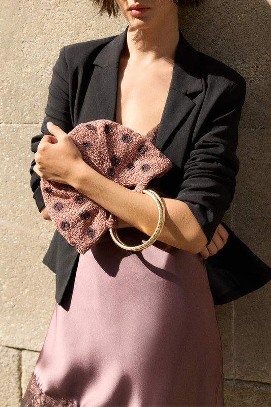Beaded polka dot handbag with metal handle