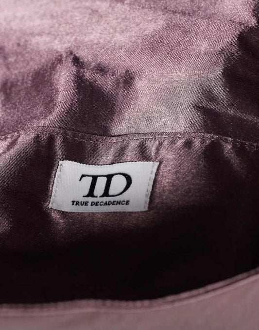 True Decadence petal embellished clutch bag in dark purple